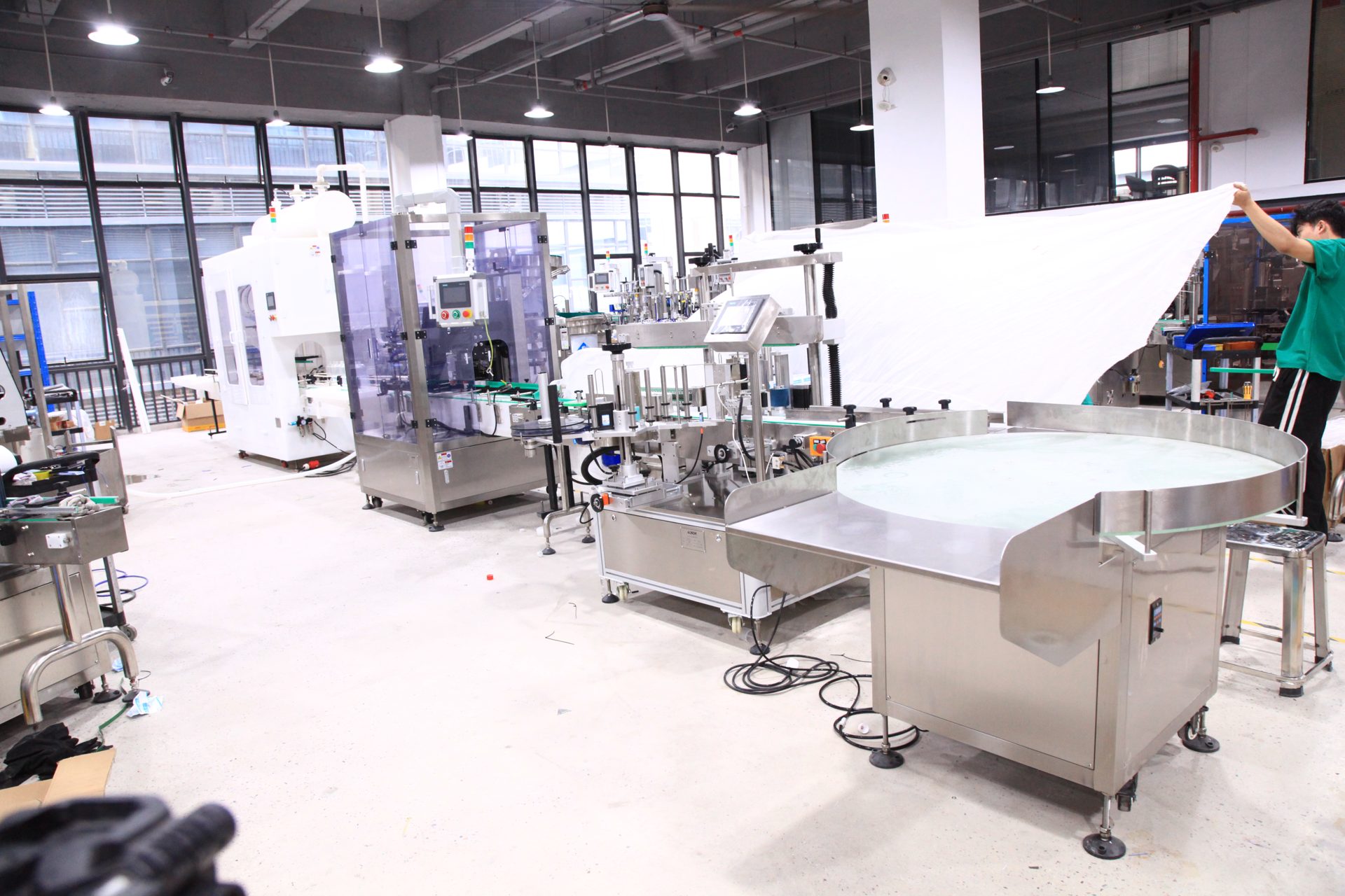 0629 Anti-corrosion filling, capping and labeling line: Angled view 1