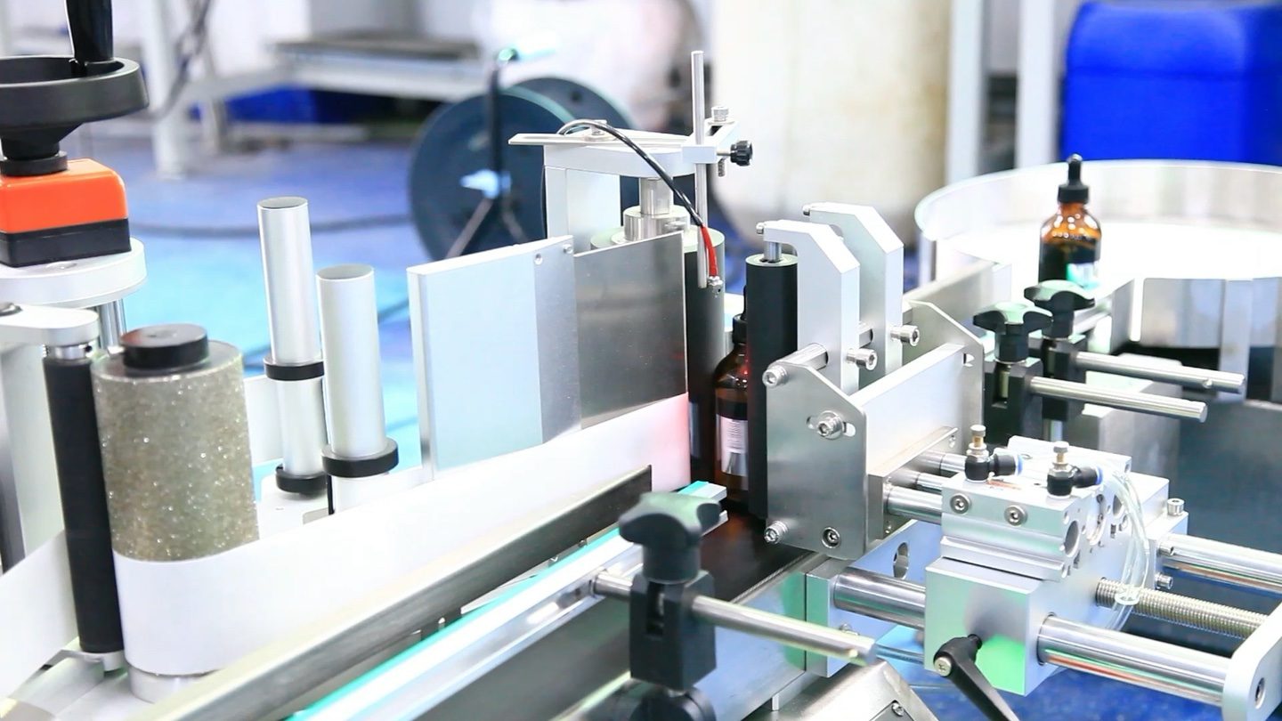 Tabletop dropper-bottle filling, capping and labeling line
